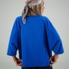 ago_silk_blue_shirt تصویر از پشت شومیز سیلک آستین سه ربع آبی